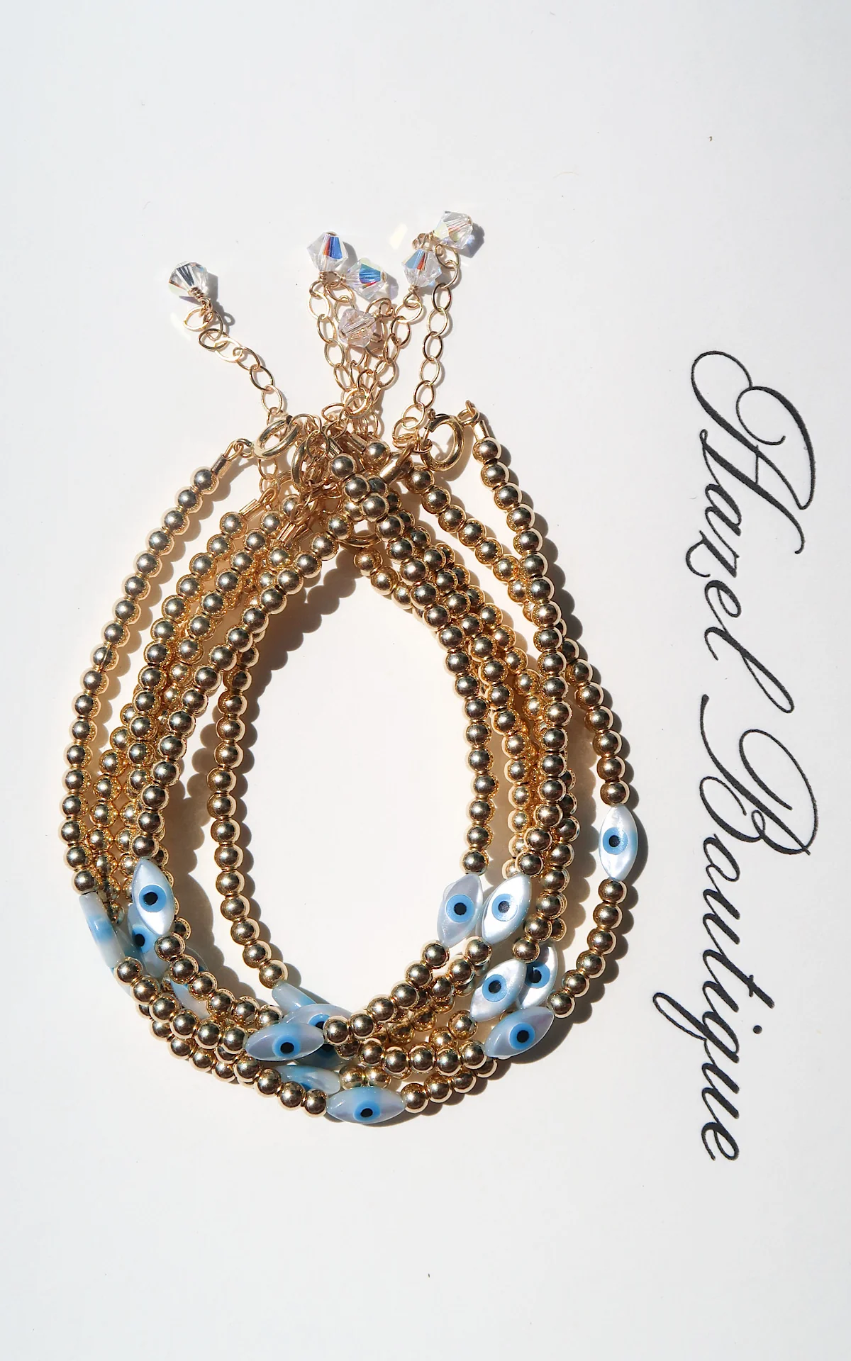 14k Gold Filled White Evil Eye Bracelet - Image 2